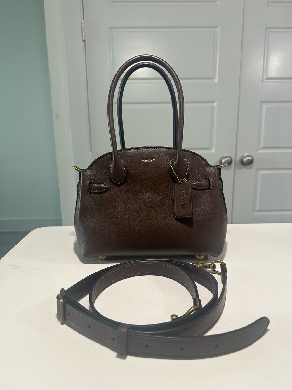 Coach empire 21 in Maple